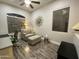 Cozy office space with comfortable chair, footrest and modern furnishings, with natural light at 2042 W Periwinkle Way, Chandler, AZ 85248