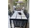 Covered outdoor patio featuring dining furniture and desert landscape at 2042 W Periwinkle Way, Chandler, AZ 85248