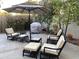 Outdoor seating area featuring cushioned chairs, side tables, and lush trees at 2042 W Periwinkle Way, Chandler, AZ 85248