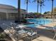 Community pool and spa area with lounge chairs, perfect for relaxation and recreation at 2042 W Periwinkle Way, Chandler, AZ 85248