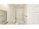 Clean bathroom with a tub and shower combination, granite countertop, and plenty of light at 20435 W Mountain Sage Dr, Buckeye, AZ 85326