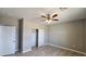 This bedroom features a ceiling fan and a closet with sliding doors at 20435 W Mountain Sage Dr, Buckeye, AZ 85326