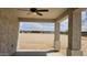 Covered patio showcasing the spacious outdoor living area with a view at 20435 W Mountain Sage Dr, Buckeye, AZ 85326