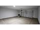 Spacious two-car garage with automatic door and ample room for storage and tools at 20435 W Mountain Sage Dr, Buckeye, AZ 85326