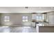 Bright kitchen with granite countertops, an island, and scenic views from the windows at 20435 W Mountain Sage Dr, Buckeye, AZ 85326