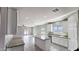 The kitchen features an island and is open to the living space at 20435 W Mountain Sage Dr, Buckeye, AZ 85326