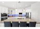 Stylish kitchen with granite counters, stainless steel appliances, and a large center island at 22262 E Cherrywood Ct, Queen Creek, AZ 85142