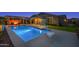 Backyard oasis featuring a pool, putting green, and outdoor basketball hoop at 22262 E Cherrywood Ct, Queen Creek, AZ 85142