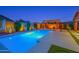 Stunning backyard pool with a fire pit and a basketball hoop, great for outdoor entertaining and recreation at 22262 E Cherrywood Ct, Queen Creek, AZ 85142