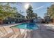Community pool for residents includes plenty of seating on a sunny day at 2301 E University Dr # 233, Mesa, AZ 85213
