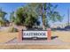 Eastbrook community sign is set against a well manicured yard at 2301 E University Dr # 233, Mesa, AZ 85213