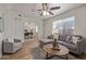 Bright living room with a ceiling fan, with stylish gray furniture and views to study at 2301 E University Dr # 233, Mesa, AZ 85213