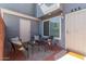 Inviting outdoor patio featuring comfortable seating and a secure gated entrance at 2301 E University Dr # 233, Mesa, AZ 85213