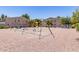 A common playground area with a swing set for families to enjoy at 2301 E University Dr # 233, Mesa, AZ 85213