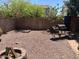 Enjoy outdoor cooking with a barbecue smoker grill in this private, desert-landscaped backyard at 2411 W Lucia Dr, Phoenix, AZ 85085