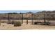Backyard view of the black iron fence bordering the property at 2411 W Lucia Dr, Phoenix, AZ 85085