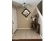 A home entryway featuring tile floors and western decor at 2411 W Lucia Dr, Phoenix, AZ 85085