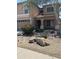 Charming home with desert landscaping, flowering bushes, rocks, and a two-car garage at 2411 W Lucia Dr, Phoenix, AZ 85085