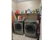 A laundry room featuring two gray LG washing machines at 2411 W Lucia Dr, Phoenix, AZ 85085
