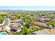 Overhead neighborhood shot highlighting the community, mountain views, lush landscaping, and desirable location at 2726 S 160Th Ave, Goodyear, AZ 85338
