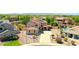 Beautiful two-story home featuring a red tile roof, solar panels, desert landscaping, and a spacious driveway at 2726 S 160Th Ave, Goodyear, AZ 85338