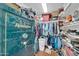 Walk-in closet features organized clothing racks and storage at 2820 E Surrey Ave, Phoenix, AZ 85032