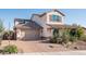 Well-maintained two-story home with a spacious driveway, a two-car garage, and mature landscaping at 2915 W Night Owl Ln, Phoenix, AZ 85085