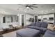 Bright living room with a comfortable sofa, an open layout, and a view into the kitchen at 2915 W Night Owl Ln, Phoenix, AZ 85085