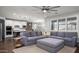 Spacious living area with modern furniture, an open layout, and abundant natural light at 2915 W Night Owl Ln, Phoenix, AZ 85085