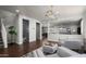 Stylish living room showcasing dark wood floors, comfortable seating, and open-concept design at 2915 W Night Owl Ln, Phoenix, AZ 85085