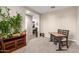 Versatile bonus room with carpet and an open layout to the kitchen at 30089 W Rockmount Ave, Buckeye, AZ 85396
