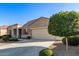Lovely single-story home featuring a two-car garage and low-maintenance desert landscaping at 30089 W Rockmount Ave, Buckeye, AZ 85396