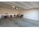 Spacious garage with ample storage and overhead lighting, ready for parking and projects at 30089 W Rockmount Ave, Buckeye, AZ 85396