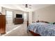 Large main bedroom with natural light, carpet, and neutral walls at 30089 W Rockmount Ave, Buckeye, AZ 85396
