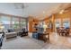 Open-concept living room with views of the kitchen, stainless steel appliances, and eat-in breakfast nook at 31017 N 41St Pl, Cave Creek, AZ 85331