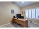 Home office featuring a large desk and bright natural light at 31017 N 41St Pl, Cave Creek, AZ 85331