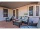 A covered patio featuring stylish seating and decor to enjoy the outdoors at 31017 N 41St Pl, Cave Creek, AZ 85331