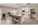 Modern kitchen features stainless steel appliances, granite countertops and an island at 4316 E Janice Way, Phoenix, AZ 85032