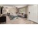 The open living room features modern furniture and ample natural light at 4316 E Janice Way, Phoenix, AZ 85032