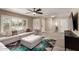 Comfortable living room with abundant natural light, tile floors, and neutral decor at 4316 E Janice Way, Phoenix, AZ 85032