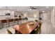 Spacious living space with a modern kitchen island, and an inviting dining area at 4316 E Janice Way, Phoenix, AZ 85032