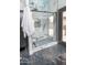 This luxurious bathroom boasts a marble tile shower and a sleek glass door to a patio at 4609 E Adobe Dr, Phoenix, AZ 85050