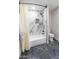 This bathroom boasts a bathtub with marble accents and a toilet at 4609 E Adobe Dr, Phoenix, AZ 85050