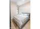 Neutral bedroom with a large window and comfortable bedding at 4609 E Adobe Dr, Phoenix, AZ 85050