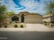 Charming single-story home featuring a well-manicured front yard, a two-car garage, and a beautiful roof at 4609 E Adobe Dr, Phoenix, AZ 85050
