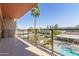 Balcony overlooking pool area with palm tree views at 4750 N Central Ave # G3, Phoenix, AZ 85012