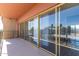 Balcony with clear view of mature palm trees and blue swimming pool at 4750 N Central Ave # G3, Phoenix, AZ 85012