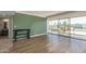 Bright and open living room area with a large window and wood floors at 4750 N Central Ave # G3, Phoenix, AZ 85012