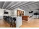 Spacious lounge area featuring a long table with chairs, snack bar, wood floors and recessed lighting at 4750 N Central Ave # G3, Phoenix, AZ 85012