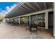 Charming outdoor patio with tables and chairs, offering a relaxing space for residents at 4750 N Central Ave # G3, Phoenix, AZ 85012